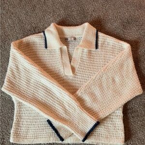 Elegant Cream V-Neck Sweater with Navy Trim